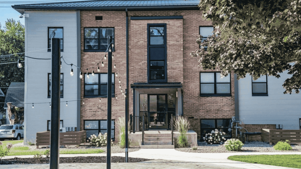 Renovations in Edmonton transforming an older apartment building into a modern rental property.